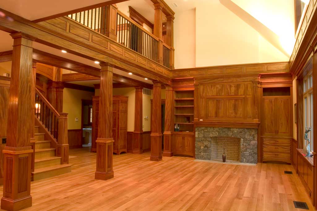 Quarterswan white oak floor and stair, everything else is mahogany in this great room. All panels are matched.