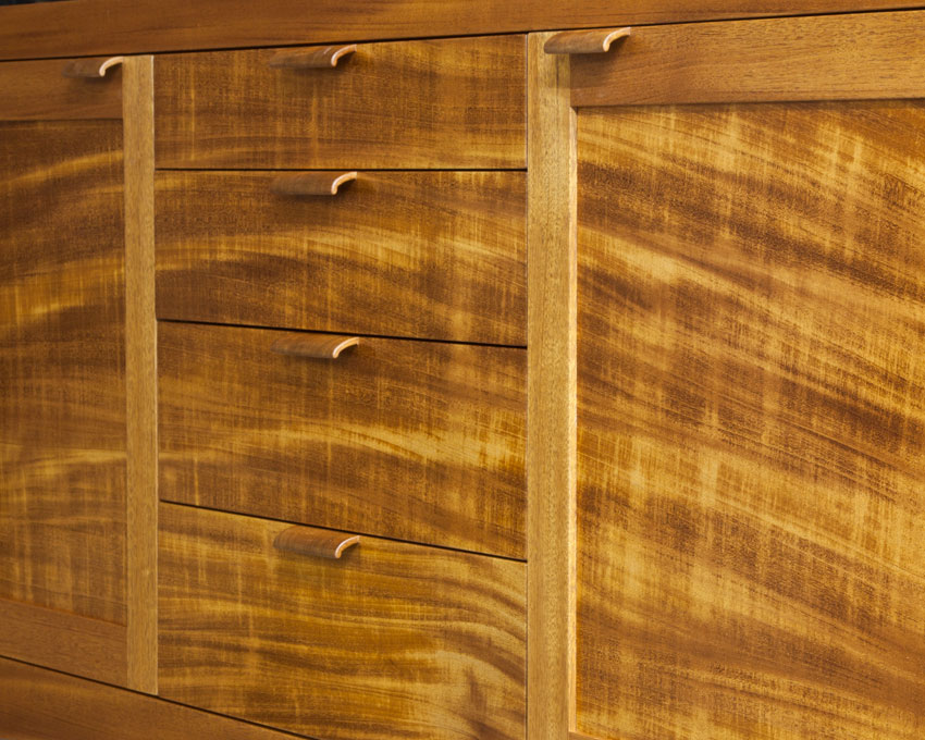 The pulls for this mahogany sideboard came from dense, end grain which gave them a dark contrast.